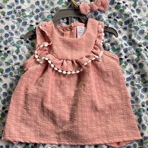 Pink Ruffled Baby Dress with Pom Pom Trim